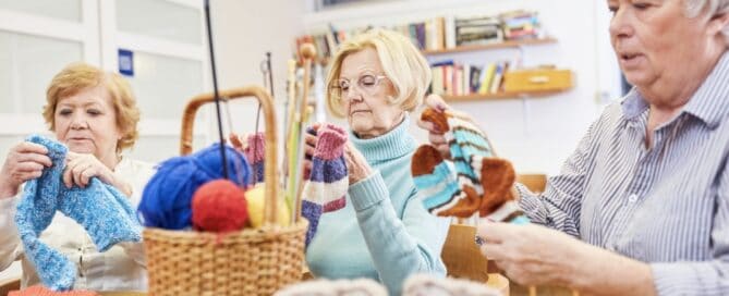 Eldery women crocheting to keep their minds active.